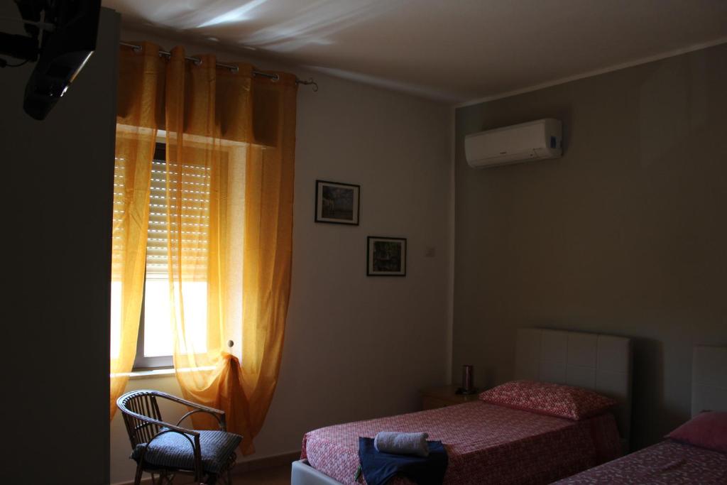 Postel nebo postele na pokoji v ubytování B&b Paolo e Daniela