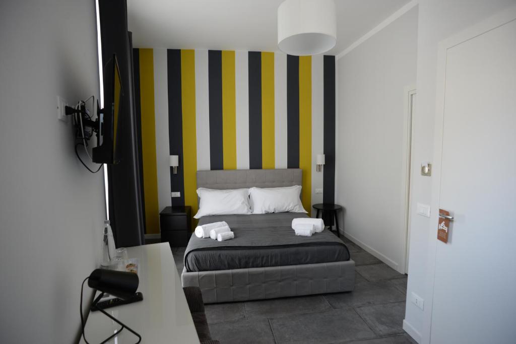 Postel nebo postele na pokoji v ubytování Barock