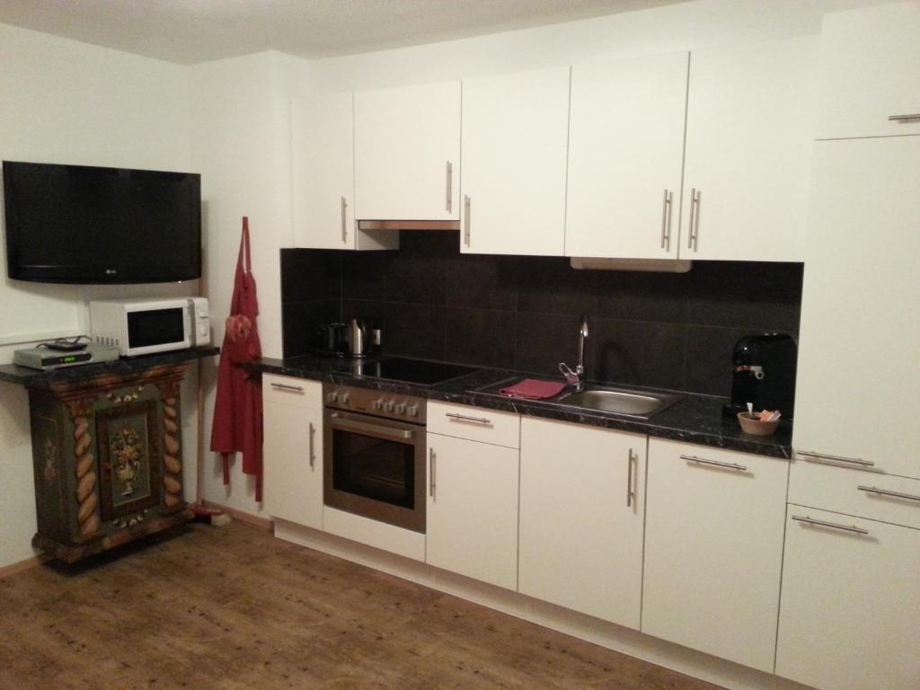 Kuchyň nebo kuchyňský kout v ubytování Apartment Sonnbichl