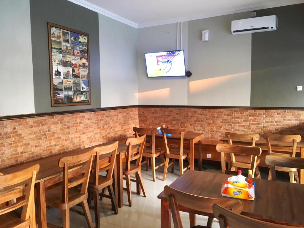 TV a/nebo společenská místnost v ubytování Griya Alsis Residence