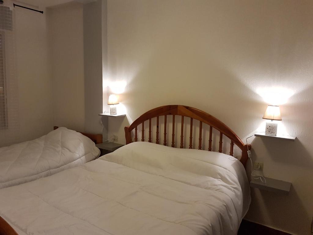 Postel nebo postele na pokoji v ubytování Apartamentos Grifovacances Consuegra 1