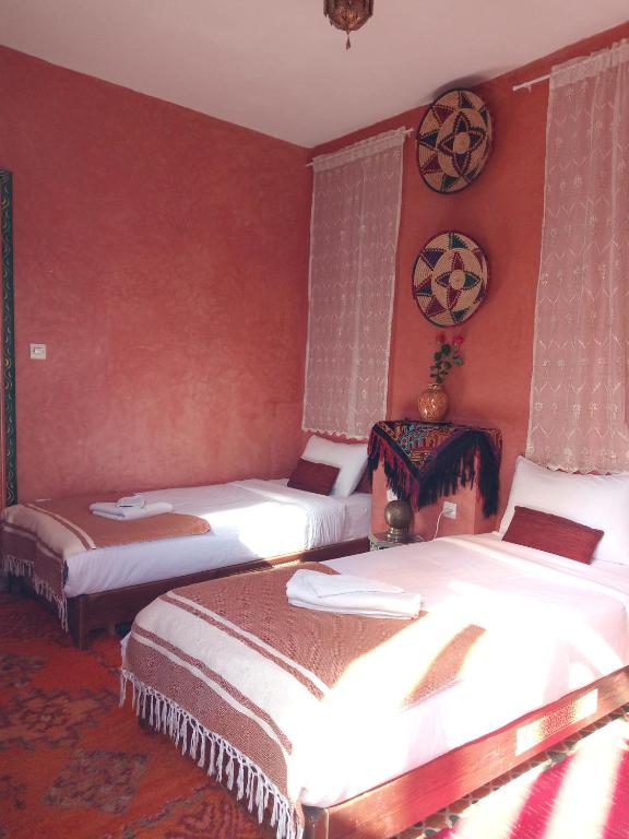 Postel nebo postele na pokoji v ubytování Riad Etoile De Mogador