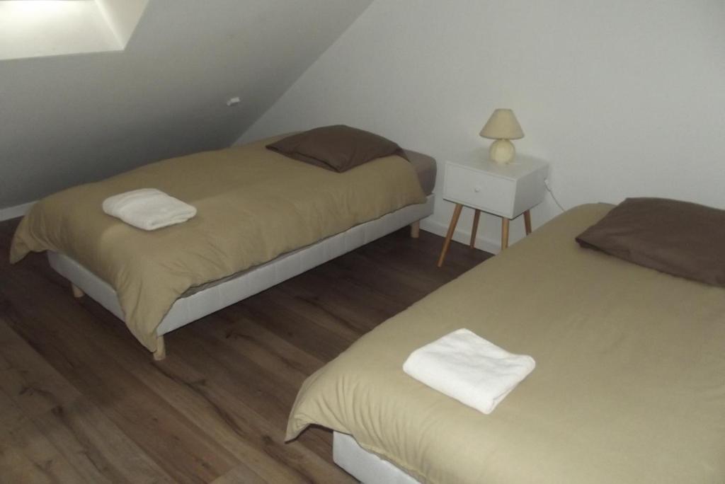 Postel nebo postele na pokoji v ubytování Le Domaine de JAUGY