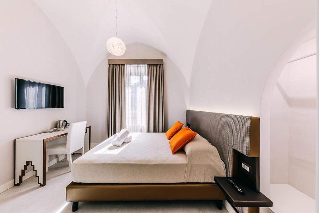 Łóżko lub łóżka w pokoju w obiekcie Maera B&B Ravello