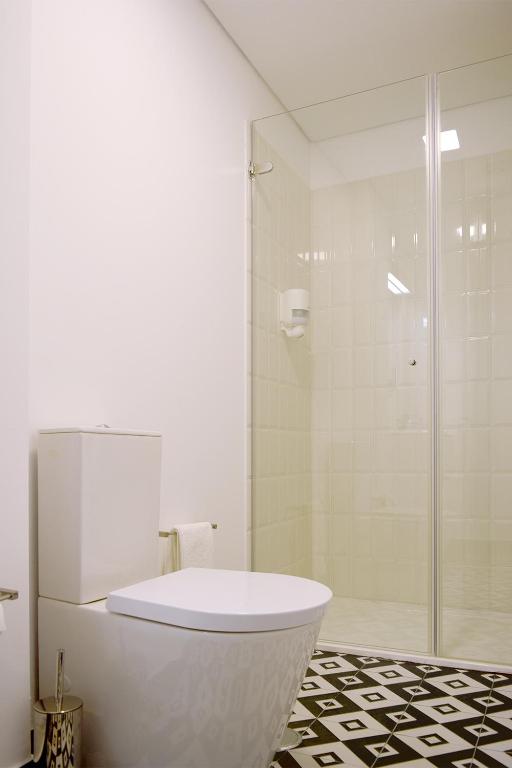 Uma casa de banho em Villa Graça -Hostels and Apartments