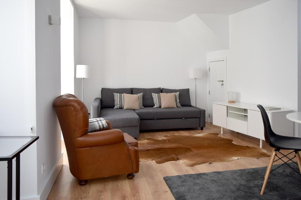 Uma área de estar em Villa Graça -Hostels and Apartments