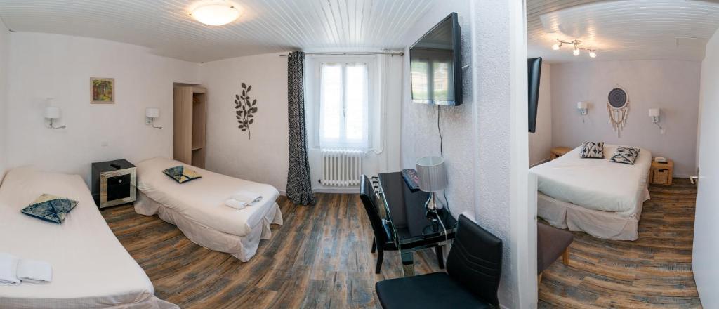 Postel nebo postele na pokoji v ubytování Hotel du Levant
