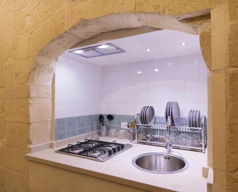 Kuchyň nebo kuchyňský kout v ubytování Balbo Suite & Apartment - Lecce Selection