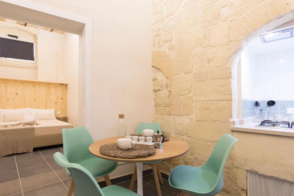 Postel nebo postele na pokoji v ubytování Balbo Suite & Apartment - Lecce Selection