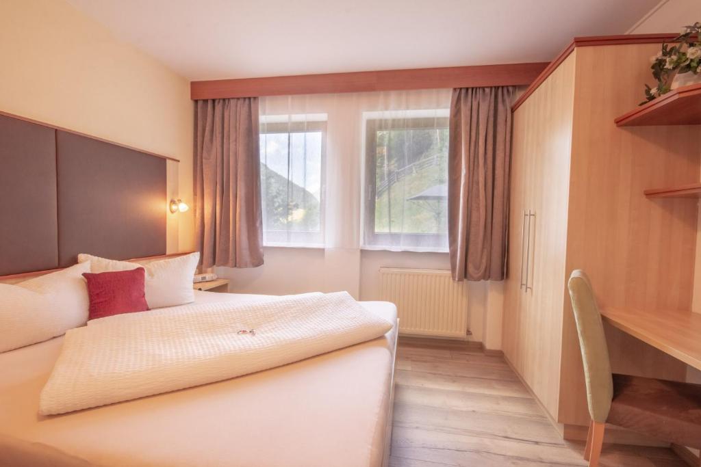 Posteľ alebo postele v izbe v ubytovaní Bella-Vista Apart Sölden