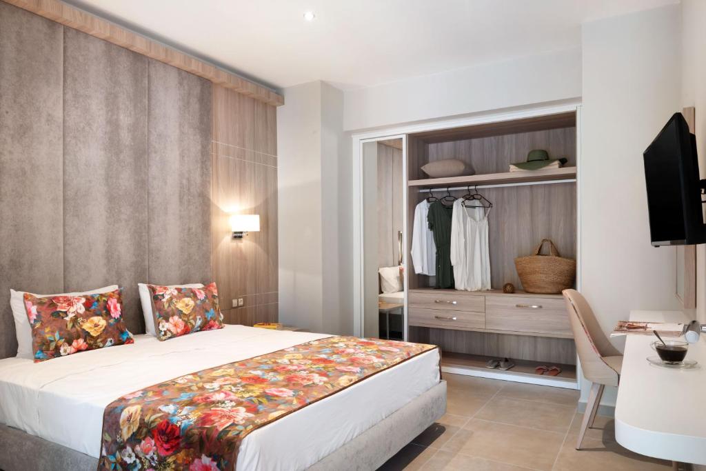 Postel nebo postele na pokoji v ubytování Alexandra Beach Spa Resort