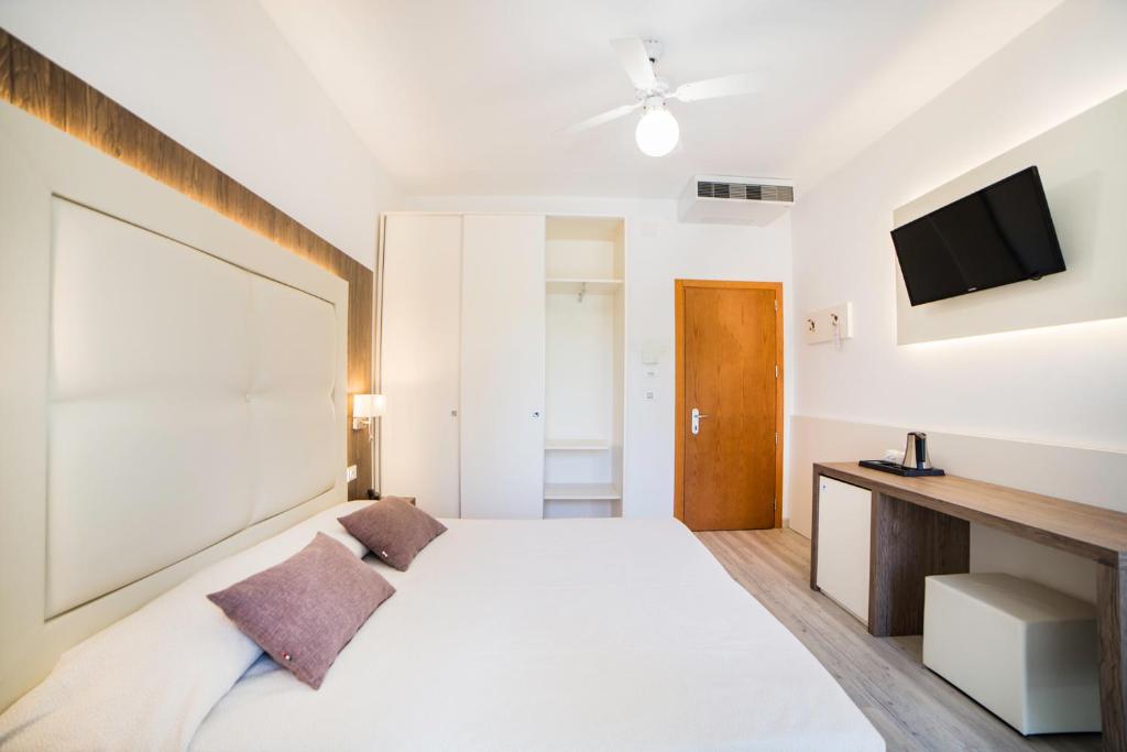 TV a/nebo společenská místnost v ubytování Hotel All'Orologio 3 Stelle Superior