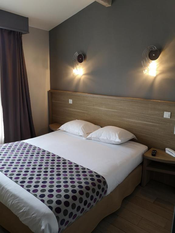 Postel nebo postele na pokoji v ubytování Atoll Hotel restaurant