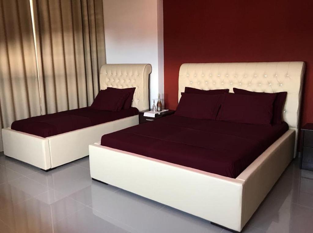 Postel nebo postele na pokoji v ubytování Hotel AlbSin