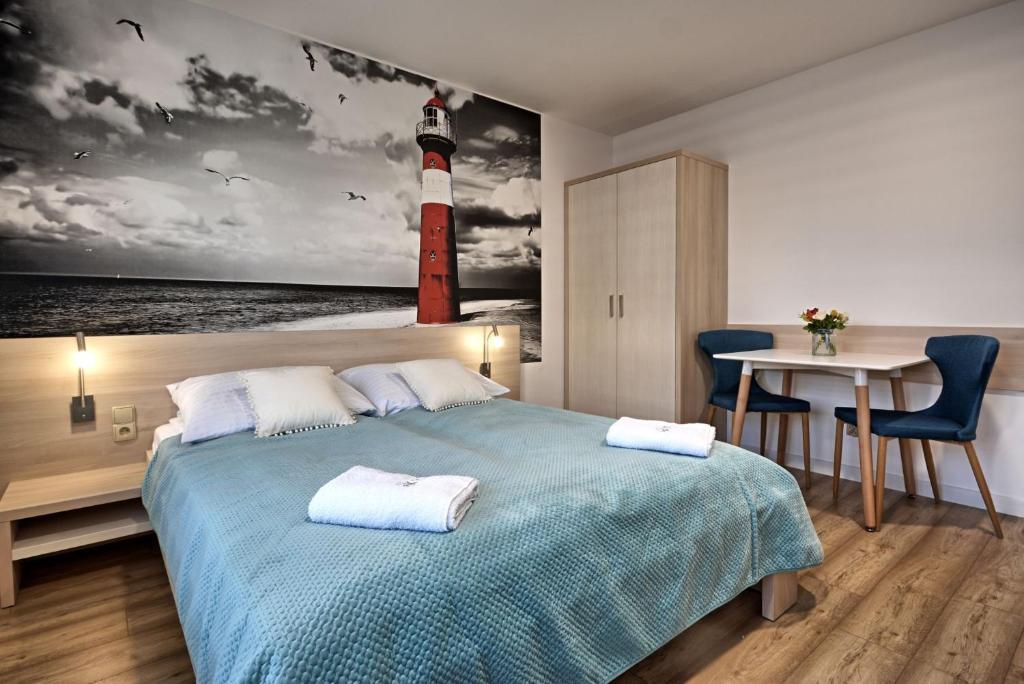 Postel nebo postele na pokoji v ubytování Akoja