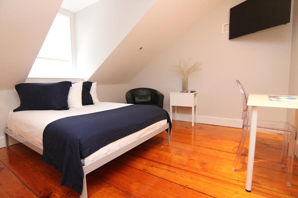 Voodi või voodid majutusasutuse Charming & Stylish Studio on Beacon Hill #15 toas