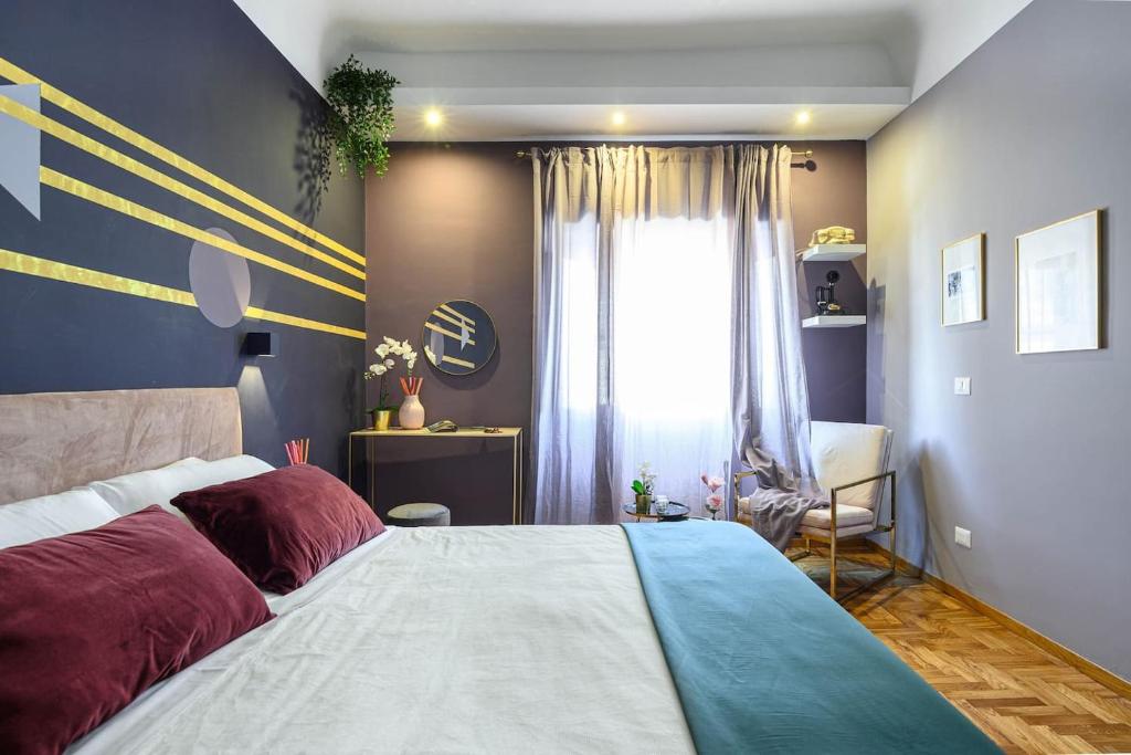 Posteľ alebo postele v izbe v ubytovaní GLAM 50 - Exlusive Penthouse in the Heart of Rome