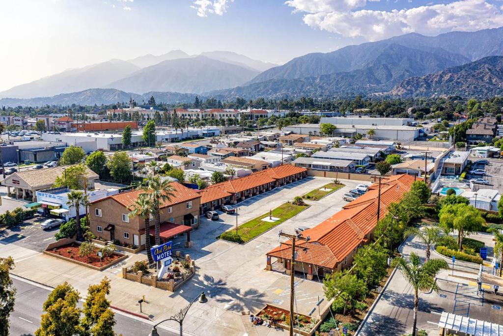 an aerial view of a town with mountains in the background at Oak Park Motel in Monrovia