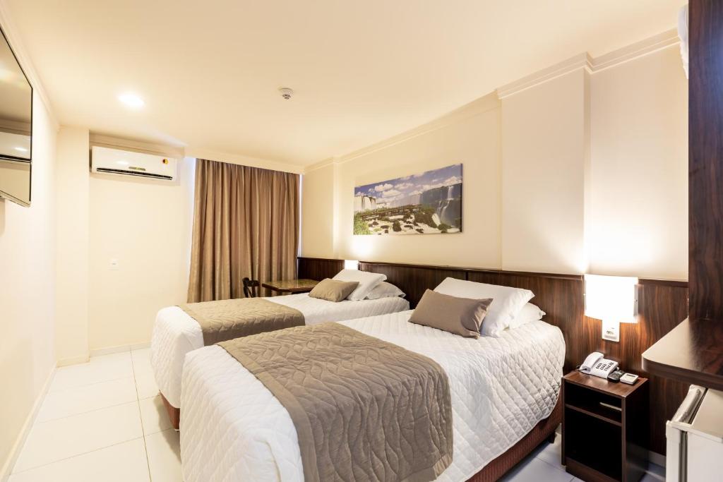 Postel nebo postele na pokoji v ubytování Bogari Hotel