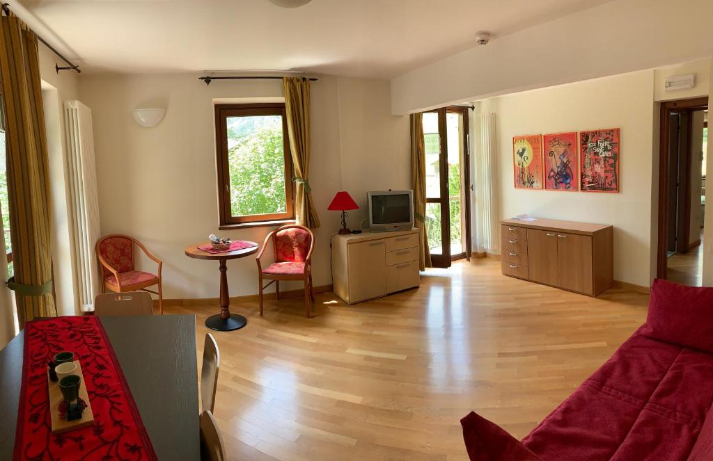 A seating area at R.T.A. Hotel Monte Rosa