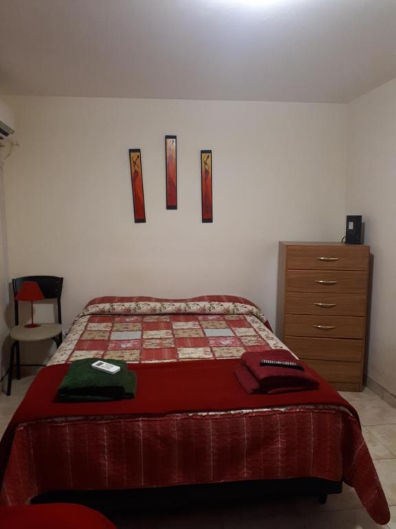 Postel nebo postele na pokoji v ubytování mi depto en cba