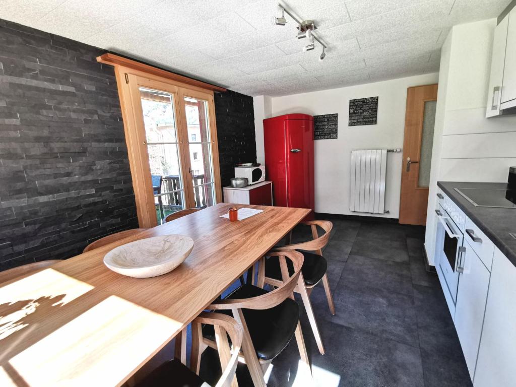 Kuchyň nebo kuchyňský kout v ubytování Apartments Chalet Tatyana