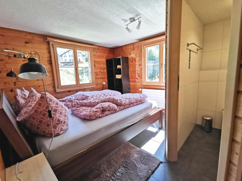 Postel nebo postele na pokoji v ubytování Apartments Chalet Tatyana