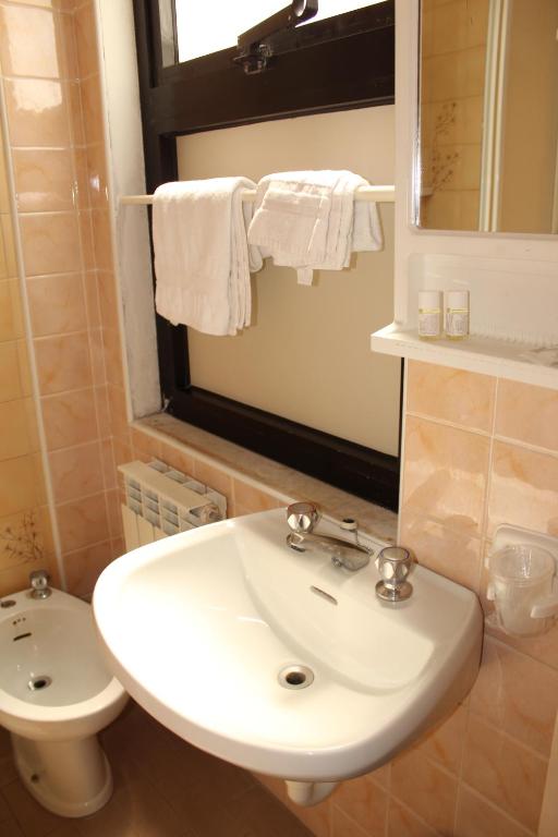 Koupelna v ubytování Hotel Caravel