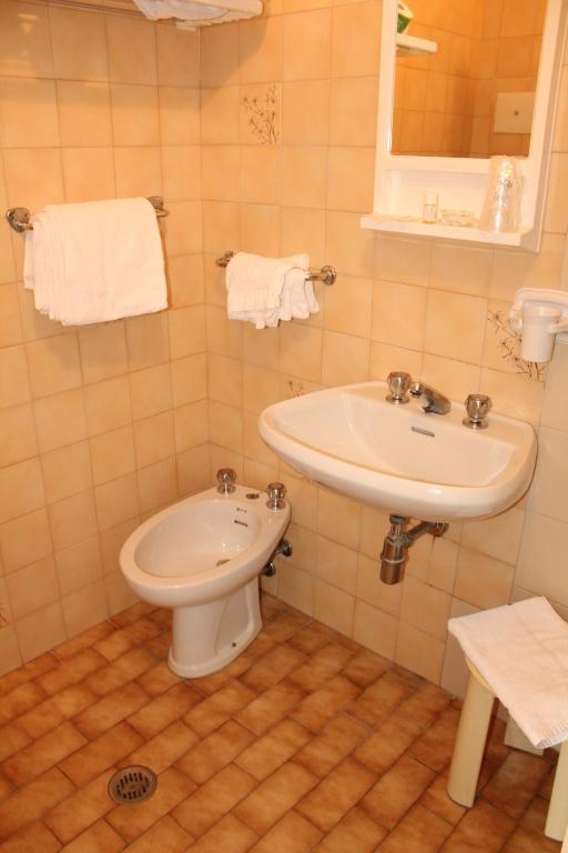 Koupelna v ubytování Hotel Caravel