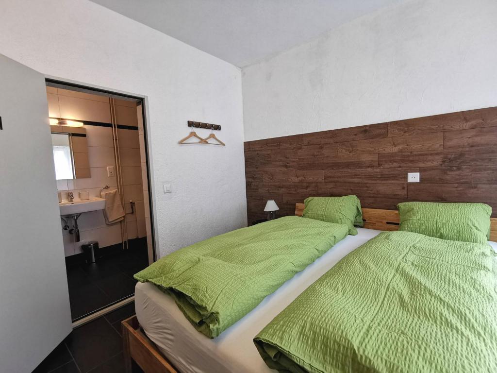 Postel nebo postele na pokoji v ubytování Apartments Steinbock