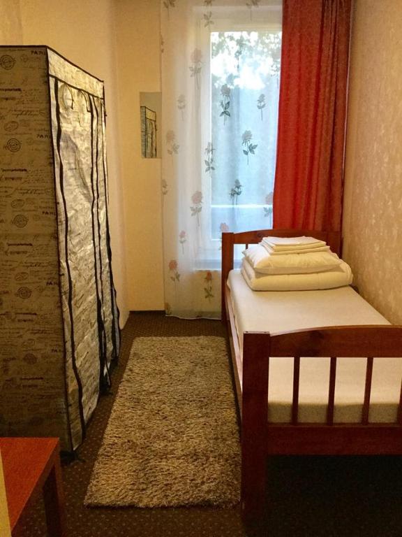 Postel nebo postele na pokoji v ubytování Harbour Hub Hostel