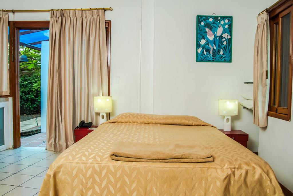 Postel nebo postele na pokoji v ubytování La Casa de Marita