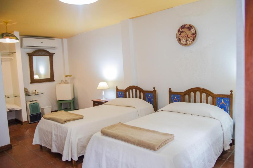 Postel nebo postele na pokoji v ubytování La Casa de Marita