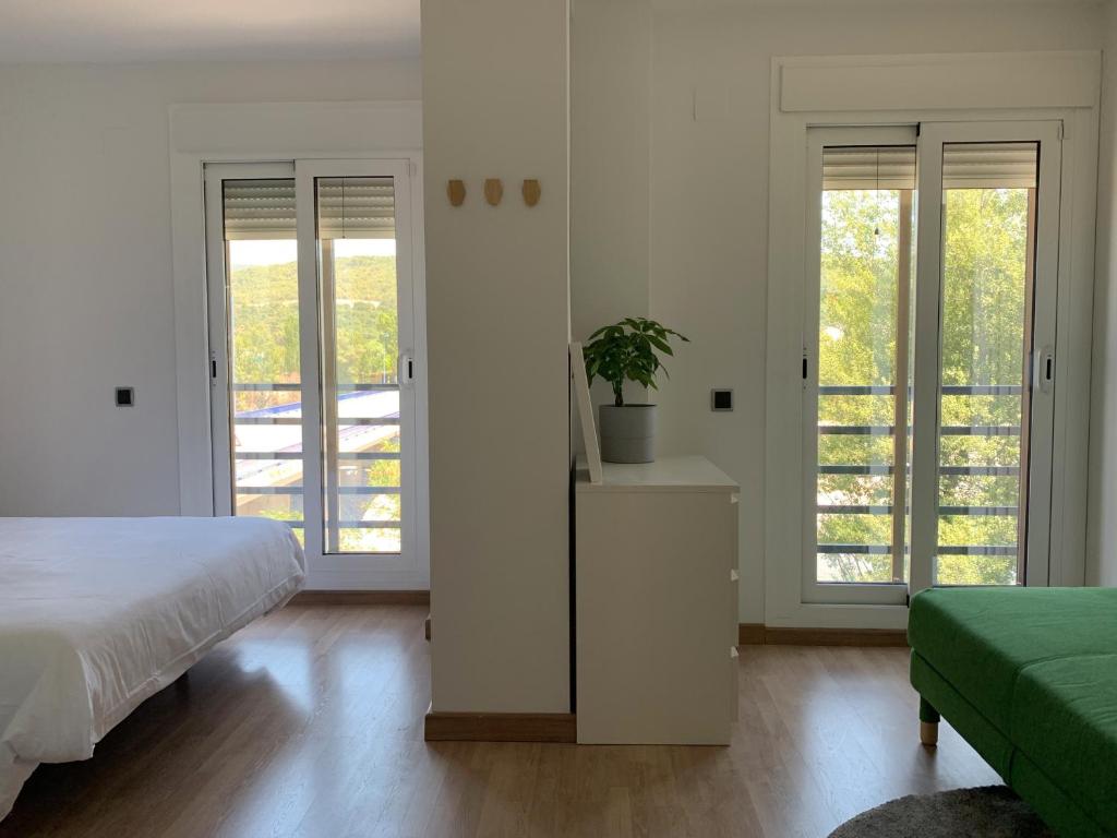 Postel nebo postele na pokoji v ubytování Apartamento Somos Ainsa