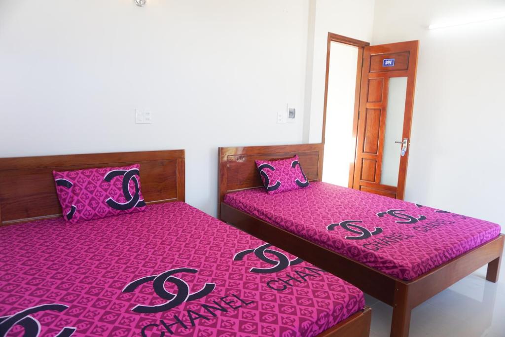 Postel nebo postele na pokoji v ubytování Gia Anh Guesthouse