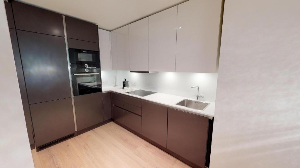 Kuchyň nebo kuchyňský kout v ubytování White Pearl Apartment 1.06