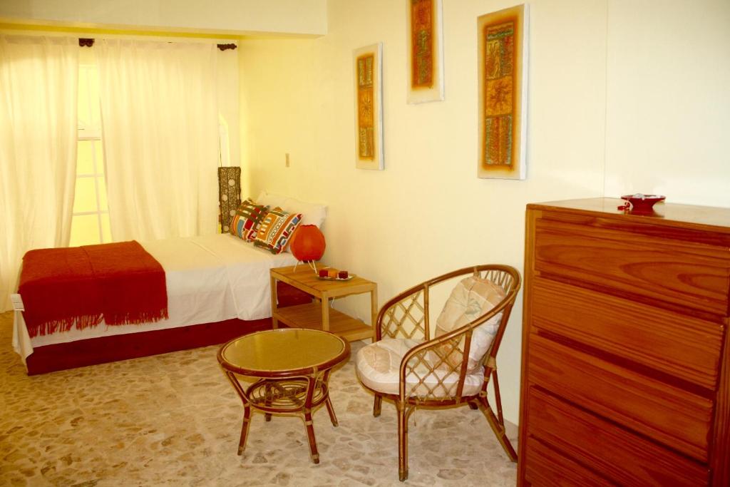 Postel nebo postele na pokoji v ubytování Hotel Magic Tropical
