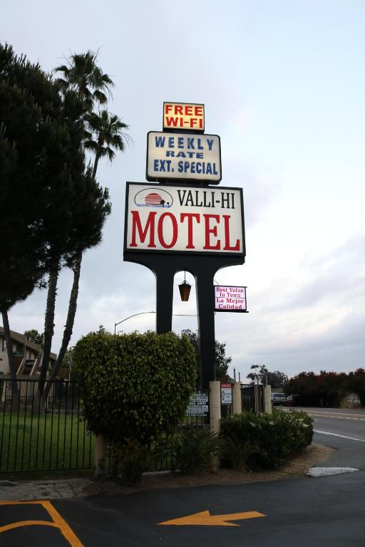 a sign for a motel on a street at Valli Hi Motel in San Ysidro, San Diego