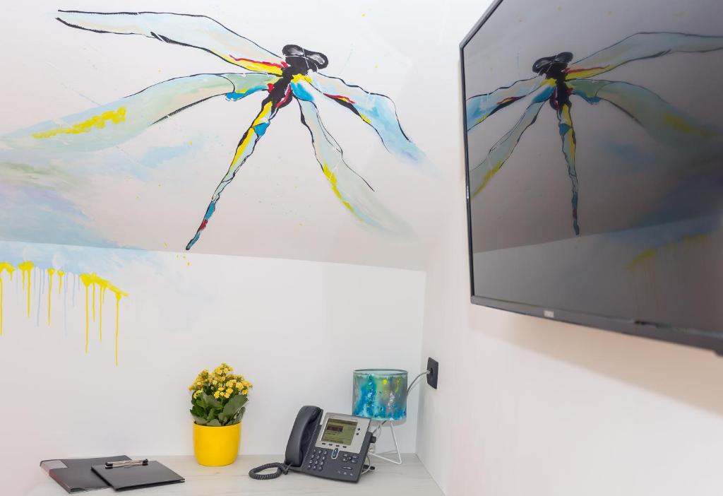 TV a/nebo společenská místnost v ubytování MiMa's Rooms