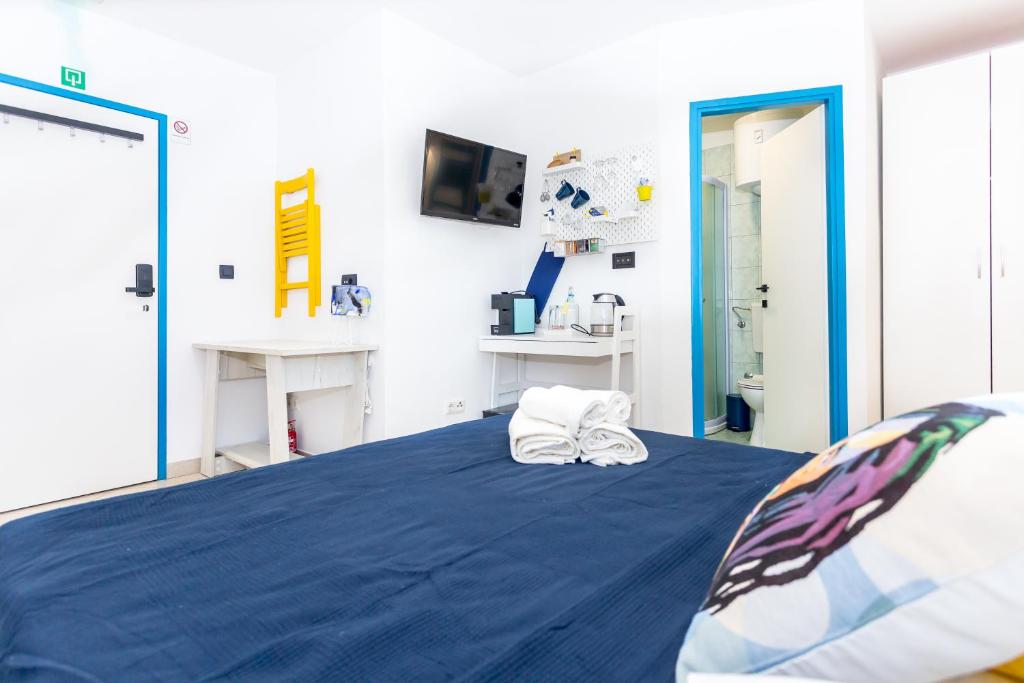 Postel nebo postele na pokoji v ubytování MiMa's Rooms