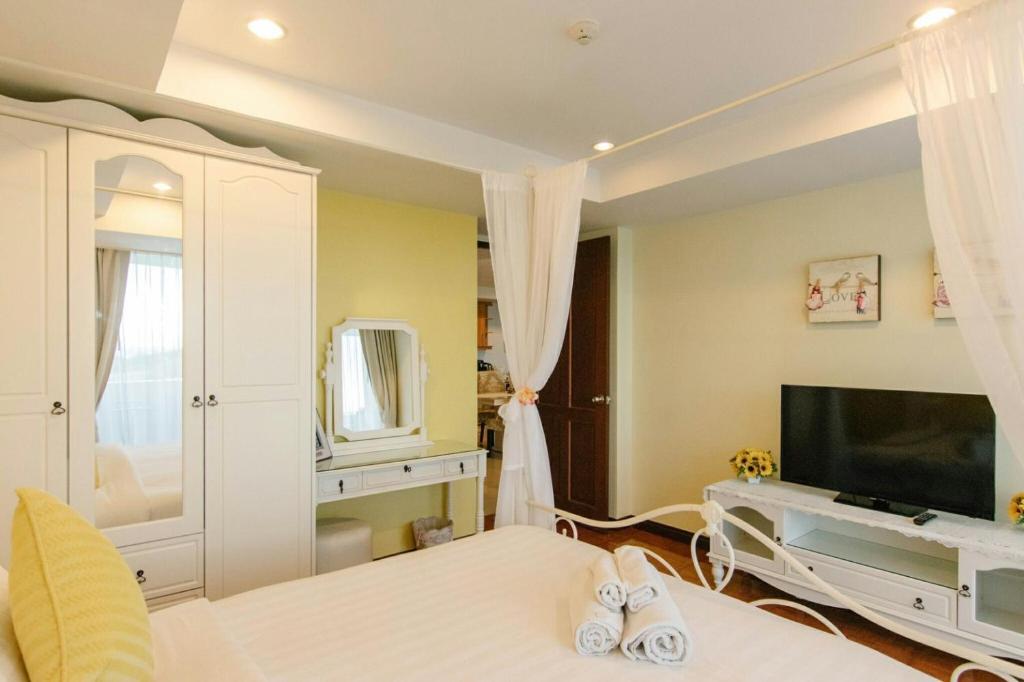 TV a/nebo společenská místnost v ubytování SeaRidge Hua Hin Resort & Poolvilla