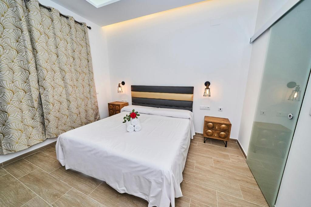 Postel nebo postele na pokoji v ubytování Hotel Bajamar Ancladero Playa