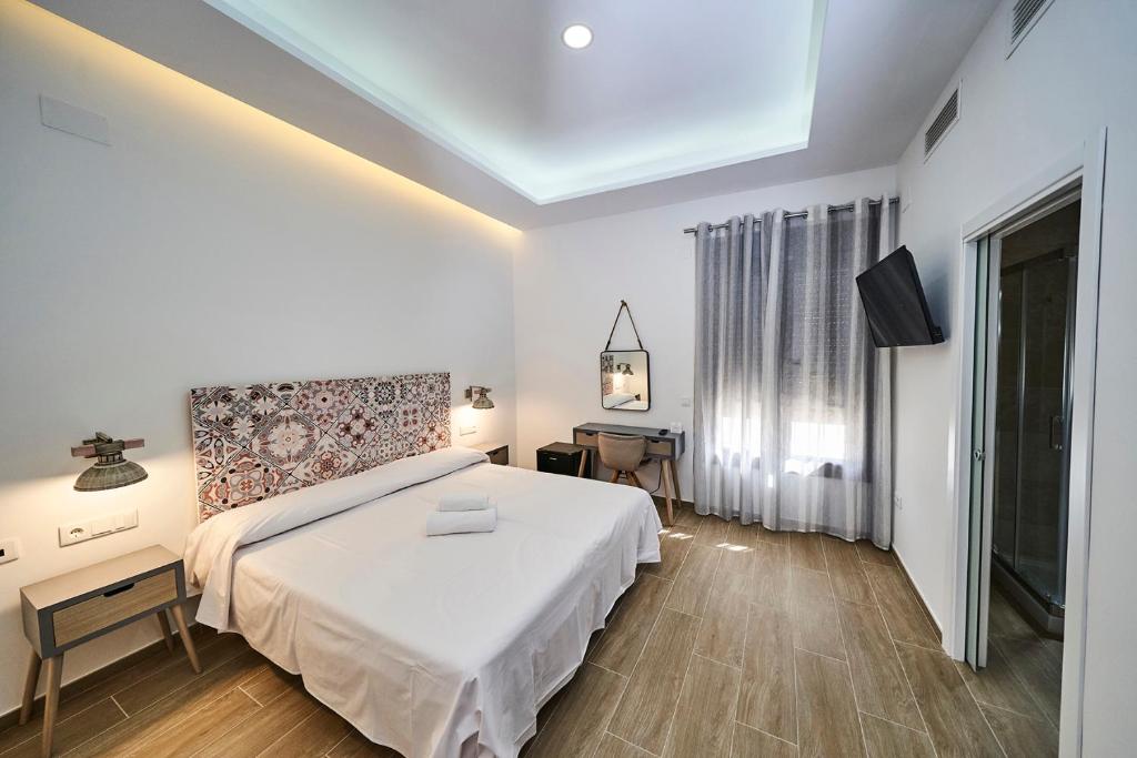 Postel nebo postele na pokoji v ubytování Hotel Bajamar Ancladero Playa