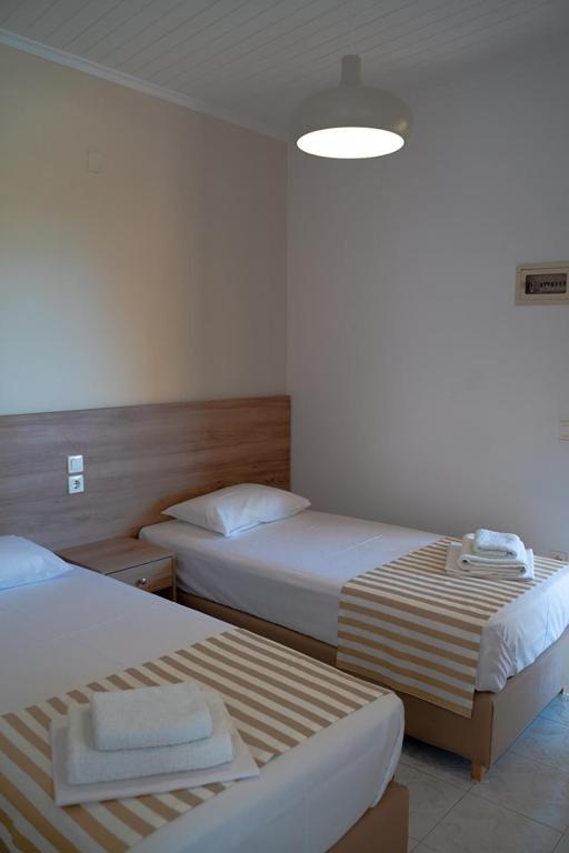 Posteľ alebo postele v izbe v ubytovaní Katerina Holiday Studios
