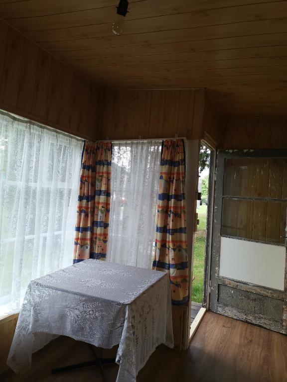 Postel nebo postele na pokoji v ubytování Pod Gwiazdami Lejkowo