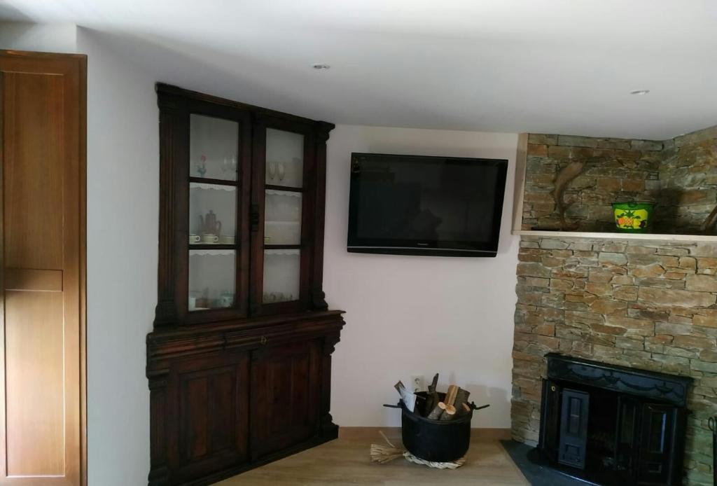 TV a/nebo společenská místnost v ubytování Apartament Forn d'ITA