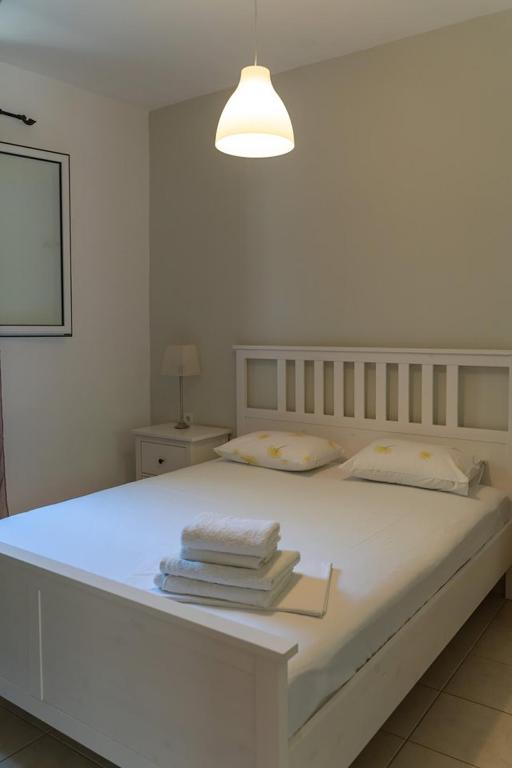 Posteľ alebo postele v izbe v ubytovaní Katerina Holiday Studios