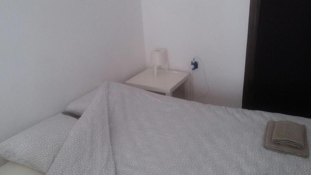 Posteľ alebo postele v izbe v ubytovaní apartman Rijeka