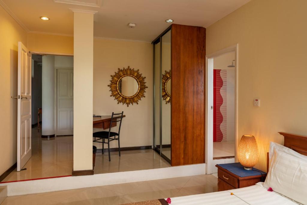 Кровать или кровати в номере Glacis Heights Villa
