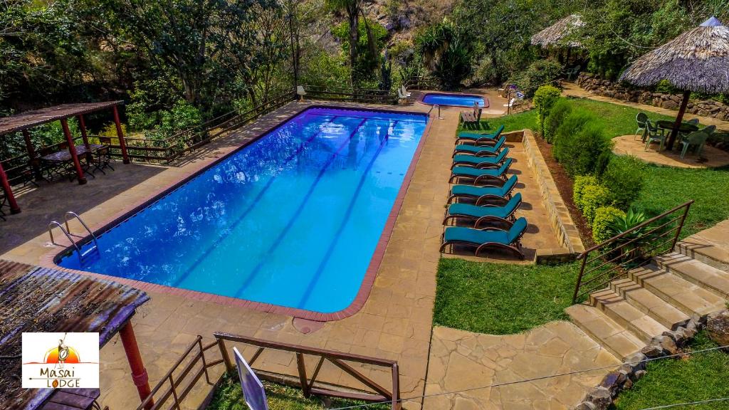 Piscina a Masai Lodge o a prop